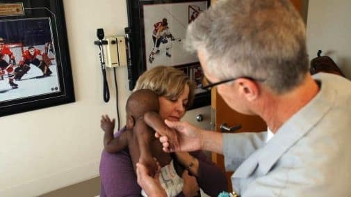 Nancy Swabb with foster baby Dominique