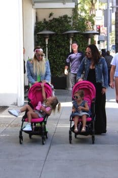 Petra Stunt and Tamara Ecclestone go for a stroll with their daughters