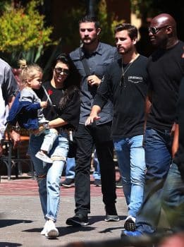 Kourtney Kardashian and Scott Disick at Disneyland with son Reign