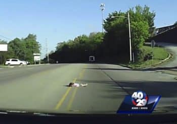 Little girl falls out of back of Bus