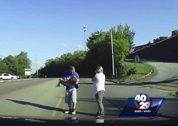 Paramedic helps after Little girl falls out of back of Bus