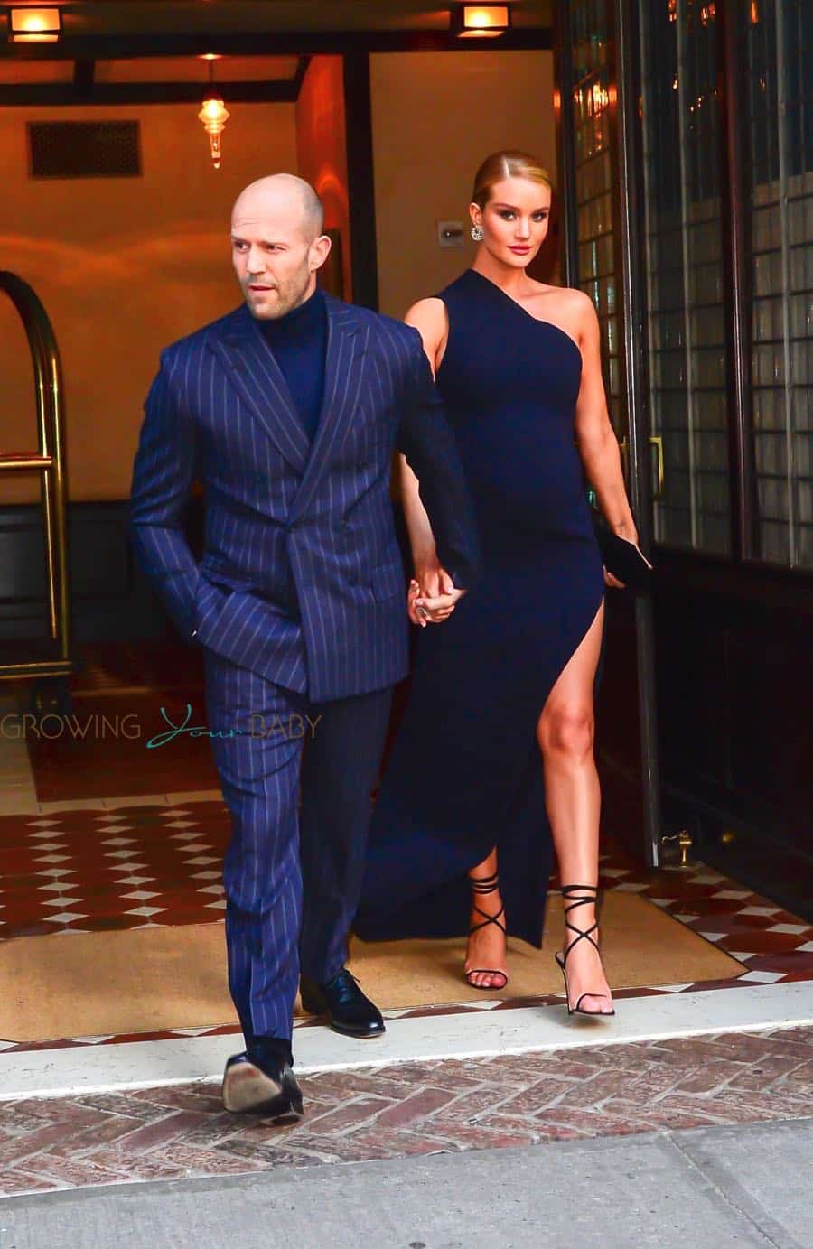 Pregnant Rosie Huntington-Whiteley and Jason Statham arrive at the premiere of 'The Fate Of The Furious'