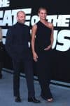Pregnant Rosie Huntington-Whiteley and Jason Statham pose at the premiere of 'The Fate Of The Furious' NYC