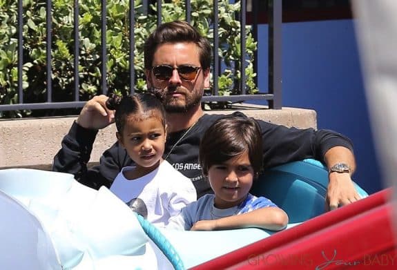 Scott Disick at DIsneyland with North West and Mason