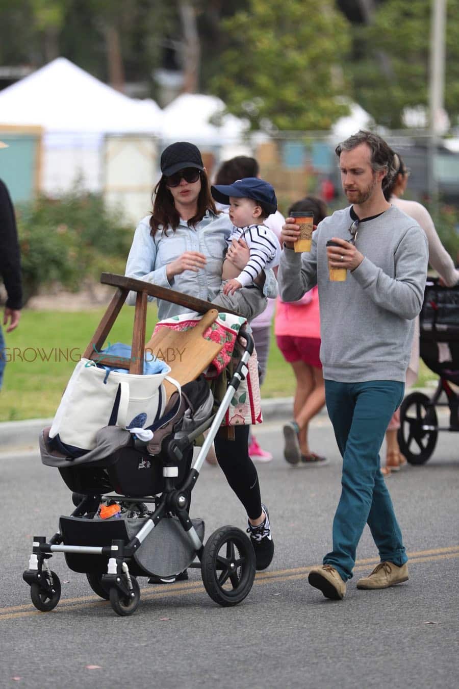 Anne Hathaway, Adam Shulman and their son Johnathon at the Rose Bowl Flea Market for Mother's Day