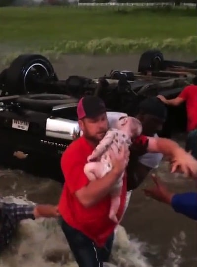 Infant rescued from floodwaters