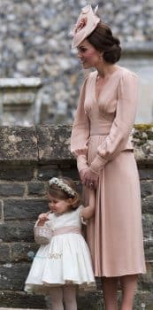 Kate Middleton and Princess Charlotte at the wedding of Pippa Middleton and James Matthews at St Mark's Church Englefield in Berkshire