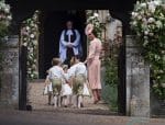 Kate Middleton with Prince George and Princess Charlotte at the wedding of Pippa Middleton and James Matthews at St Mark's Church Englefield in Berkshire