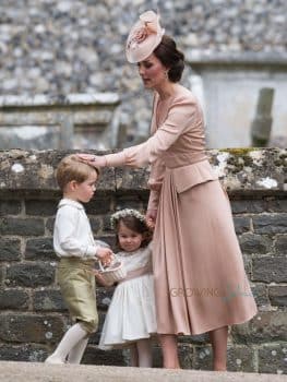 Kate Middleton with Prince George and Princess Charlotte at the wedding of Pippa Middleton and James Matthews at St Mark's Church Englefield in Berkshire