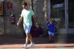 Roger Federer and his son go on a walk in Portisco