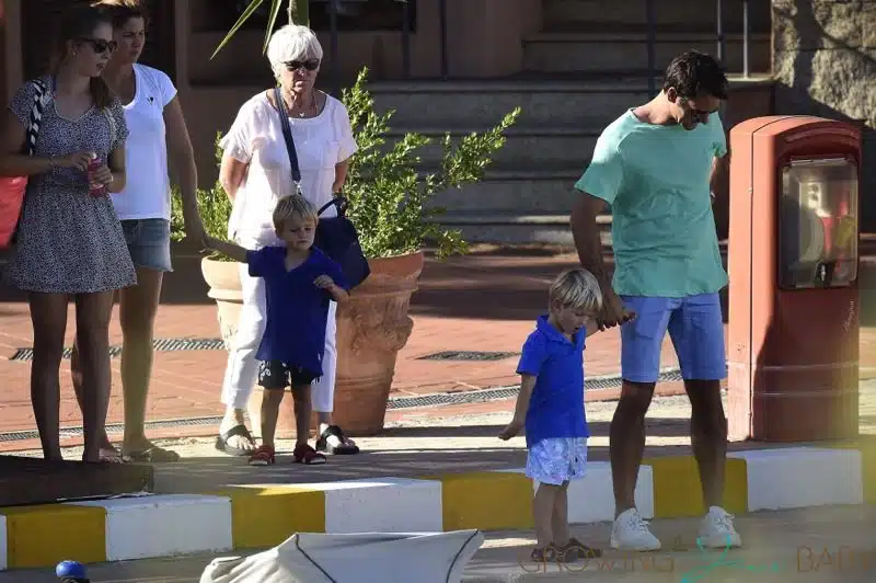 Roger Federer and his sons Leo and Lenny go on a walk in Portisco