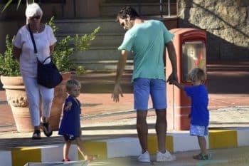 Roger Federer and his sons Leo and Lenny go on a walk in Portisco