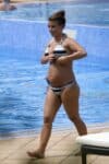 Pregnant Coleen Rooney shows her baby bump during holidays in Mallorca