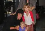 Alanis Morissette and husband Souleye take a flight out of Los Angeles at LAX with their little ones Ever and Onyx