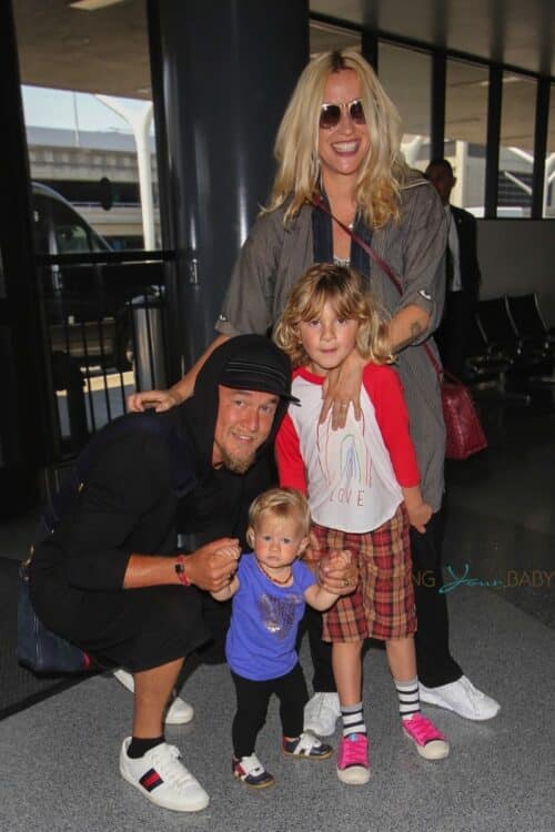 Alanis Morissette and husband Souleye take a flight out of Los Angeles at LAX with their little ones Ever and Onyx