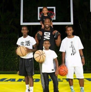 dwyane wade with sons Xavier, Zion and Zaire