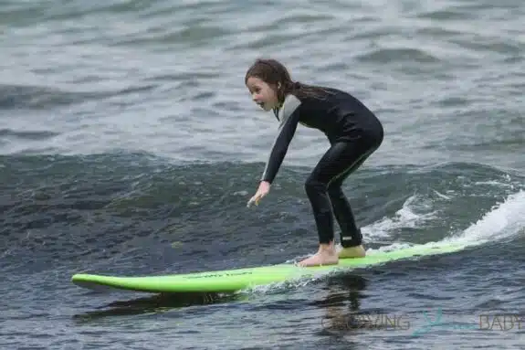 Faith Urban learns how to surf in Australia