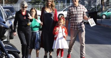 Jessica Alba and husband, Cash Warren, are seen arriving to the Lyft Community Holiday Fiesta Event with their two children, Honor and Haven