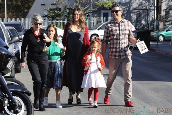 Jessica Alba and husband, Cash Warren, are seen arriving to the Lyft Community Holiday Fiesta Event with their two children, Honor and Haven
