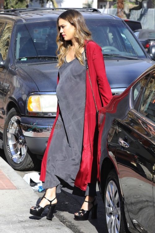 Pregnant Jessica Alba arrives at Lyft event