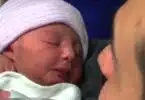 Carl Alewine with baby Anastasia