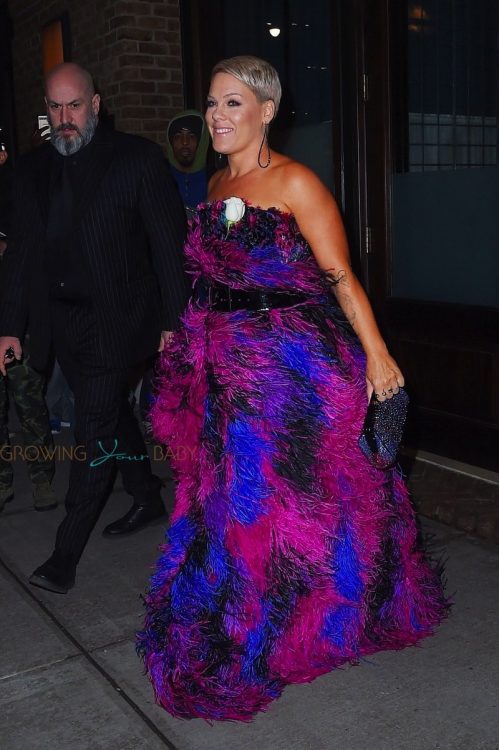 Pink spotted wearing a multicolored dress to the Grammys