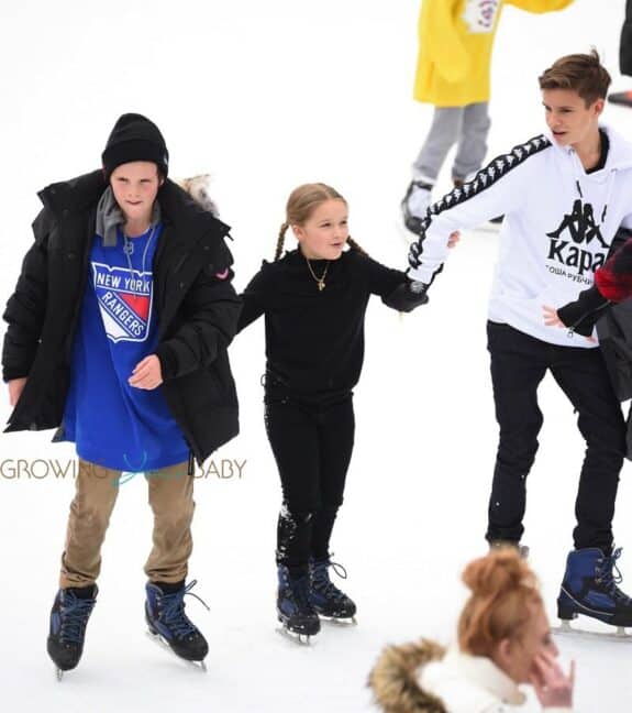 Harper Beckham, Romeo Beckham, and Cruz Beckham go ice skating with their nannies in Central Park New York City