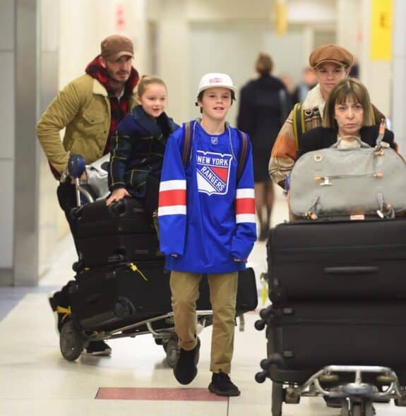 Soccer superstar David Beckham and his kids Harper, Romeo and Cruz were spotted arriving together at JFK airport in New York City