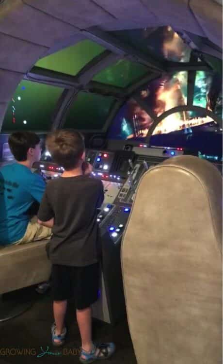 Disney Dream Oceaneer Club - kids flying the Millenium Falcon