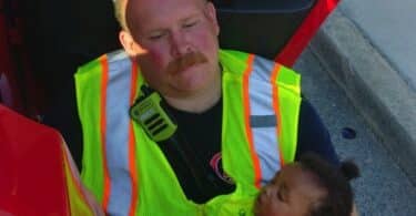 Firefighter Hailed As Hero For Cuddling Baby At Accident Scene f