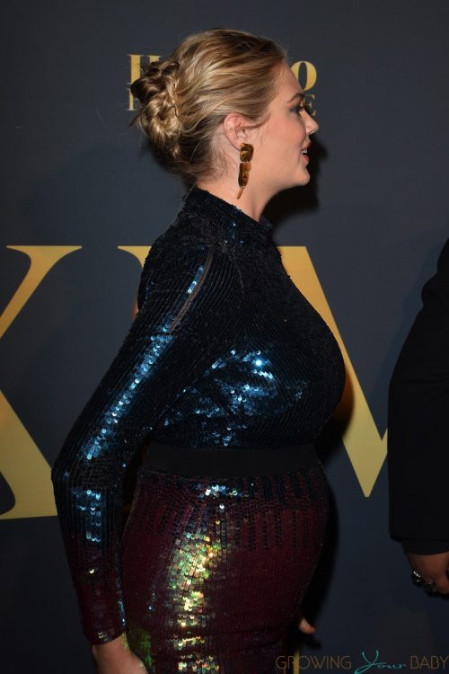 Pregnant Kate Upton poses at The Maxim Hot 100 Party