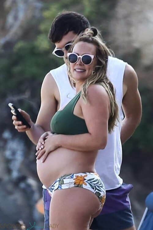 Pregnant Hilary Duff shows off her baby bump at the beach during a date with Matthew Koma