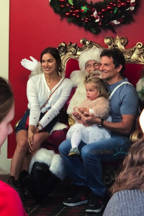 Bradley Cooper and Irina Shayk pose with daughter Lea with Santa
