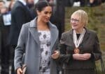 Meghan Markle shows off growing baby bump while making a visit to the Royal Variety care home f