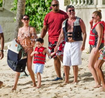 Simon Cowell and his partner Lauren Silverman and son Eric Cowell enjoy an afternoon in Barbados