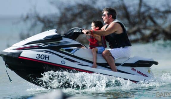 Simon Cowell and son Eric Cowell enjoy an afternoon on jet skis in Barbados