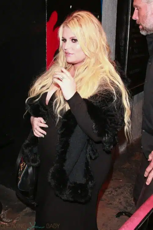 A very pregnant Jessica Simpson and Eric Johnson exit The Roxy