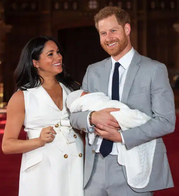 Prince Harry, Duke of Sussex and Meghan, Duchess of Sussex, pose with their newborn son Archie Harrison Mountbatten-Windsor