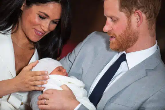 Prince Harry, Duke of Sussex and Meghan, Duchess of Sussex, pose with their newborn son Archie Harrison Mountbatten-Windsor