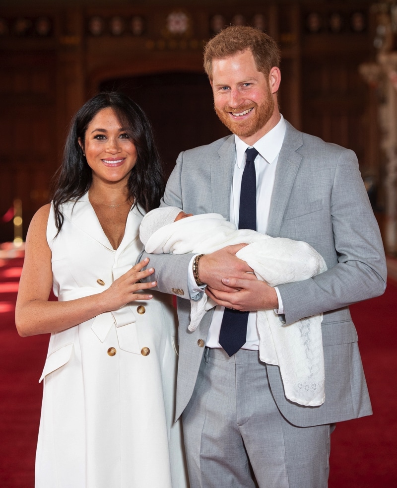 Prince Harry, Duke of Sussex and Meghan, Duchess of Sussex, pose with their newborn son Archie