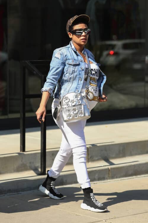 Keyshia Cole shows off her baby bump while shopping at Moschino