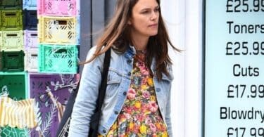 Pregnant Keira Knightley shows off her baby bump while wearing a floral dress out in London 2019