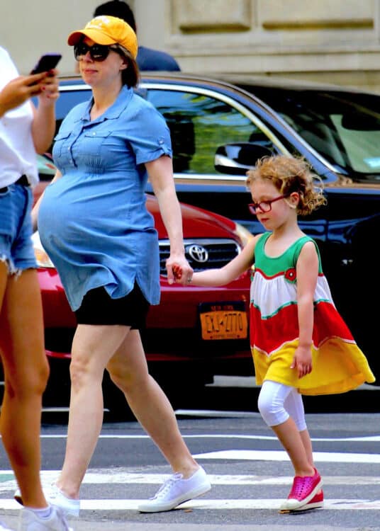 A very pregnant Chelsea Clinton out in NYC with her daughter Charlotte.jpg