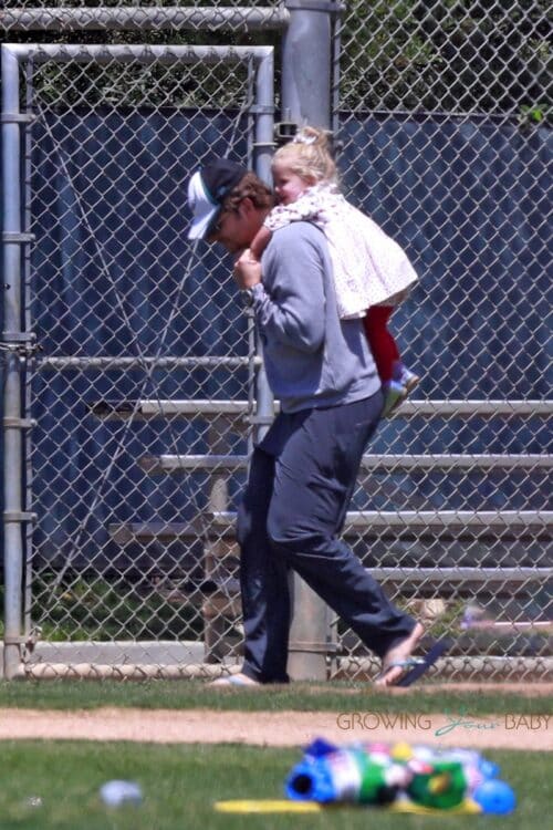 Bradley Cooper piggybacks his daughter Lea