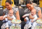 Meghan Markle is seen holding their baby son Archie, during the visit to Archbishop Desmond Tutu f