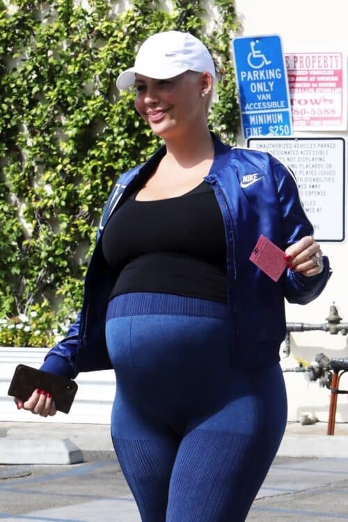A VERY pregnant Amber Rose has family lunch