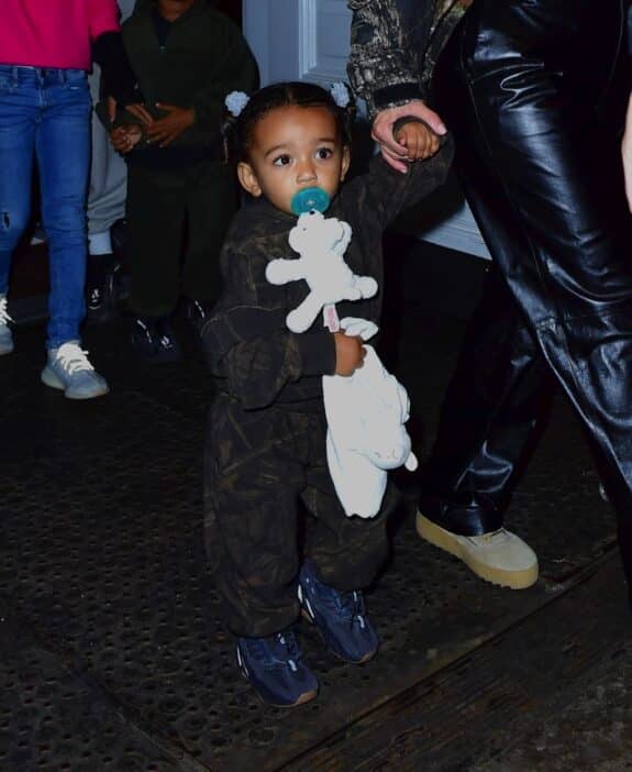 Kim Kardashian and Kanye West head to his album release party with their kids - baby Chicago