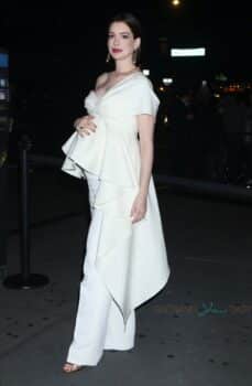 A pregnant Anne Hathaway arrives at the Amazon Prime Video "Modern Love" premiere