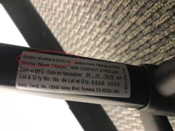 Recalled stroller model number is printed in black on a white sticker attached to the stroller’s leg