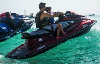 Simon Cowell on a Jetski with son Eric in Barbados